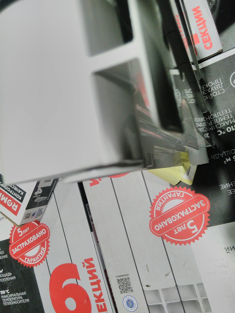 Уцененный товар (замятие ламели ерайней секции): Радиатор биметаллический ROMMER Optima BM 500 4 секций боковое подключение (RAL9016), RBM-0210-050004