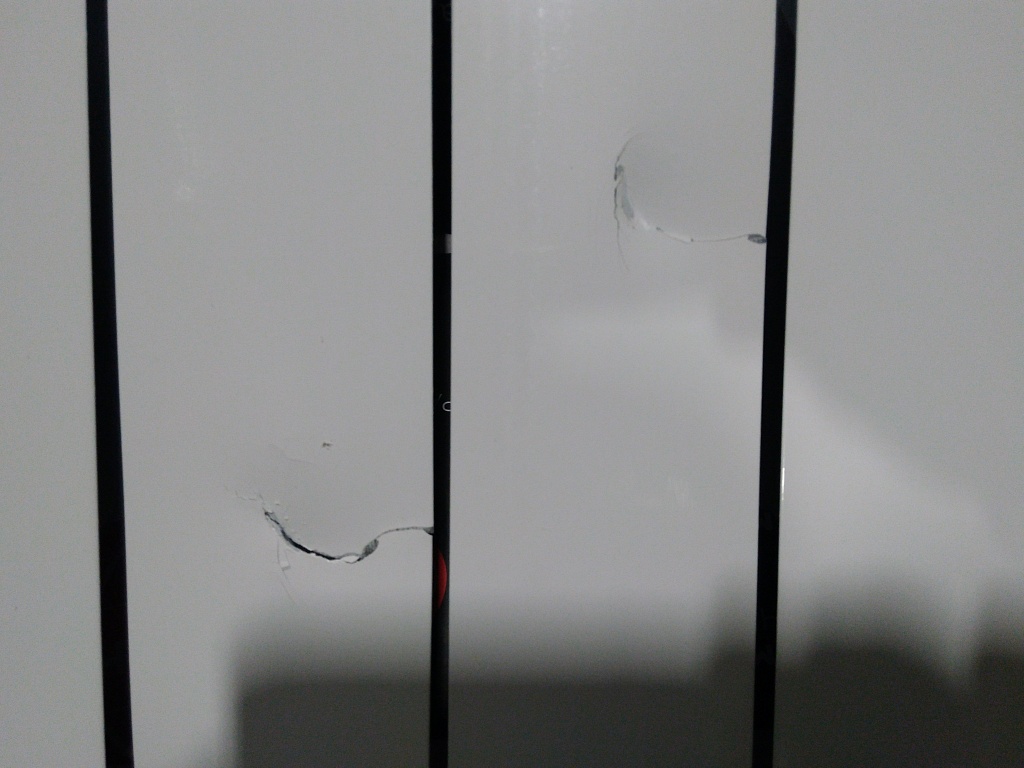 Уцененный товар (трещина, сколы на ламелях, скол в верхней части крайней секции): Радиатор биметаллический ROMMER Profi BM 350 10 секций боковое подключение (BI350-80-80-130) (RAL9016), RBM-1210-035010