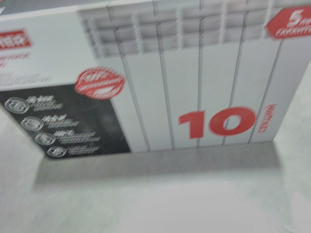 Уцененный товар (потертости в верхней части секций): Радиатор биметаллический ROMMER Plus BM 500 10 секций боковое подключение (RAL9016), RBM-3210-050010