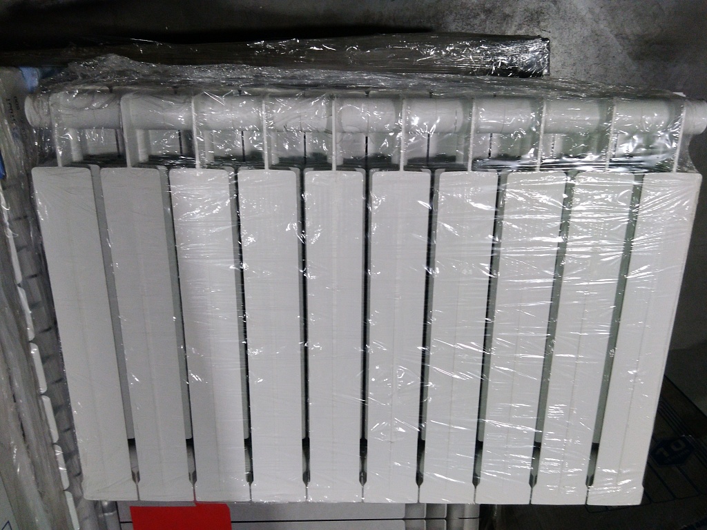 Уцененный товар (нетоварный вид упаковка, сколы на ламелях и нижних частях секций): Радиатор биметаллический STOUT STYLE 500 10 секций боковое подключение (белый RAL 9010)