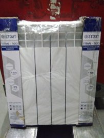 Уцененный товар (нарушена упаковка, скол краски, вмятина в верхней части крайней секции): Радиатор биметаллический STOUT TITAN 500 6 секций боковое подключение (белый RAL 9016), SRB-3310-050006