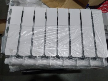 Уцененный товар (нарушена упаковка, скол краски на крайней секции): Радиатор биметаллический STOUT TITAN 350 8 секций боковое подключение (белый RAL 9016), SRB-3310-035008