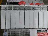 Уцененный товар (скол краски в верхней части секции, скол ламели крайней секции): Радиатор биметаллический ROMMER Profi BM 350 10 секций боковое подключение (BI350-80-80-130) (RAL9016), RBM-1210-035010