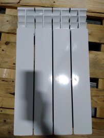 Уцененный товар (замятие на нижней части секции, вмятина в верхней части крайней секции): Радиатор биметаллический ROMMER Profi BM 500 4 секции боковое подключение (BI500-80-80-150) (RAL9016), RBM-1210-050004