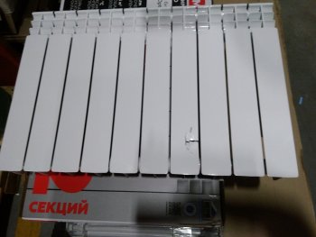 Уцененный товар (Вмятина на лицевой стороне секции): Радиатор биметаллический ROMMER Profi BM 500 10 секции боковое подключение (BI500-80-80-150) (RAL9016), RBM-1210-050010