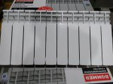 Уцененный товар (скол краски на ламели крайней секции, зав. брак литья на ламели): Радиатор биметаллический ROMMER Profi BM 350 10 секций боковое подключение (BI350-80-80-130) (RAL9016), RBM-1210-035010